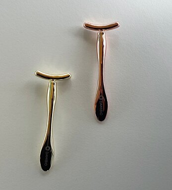 DAMIBIO masážní aplikátor T žluté zlato v dárkové taštičce